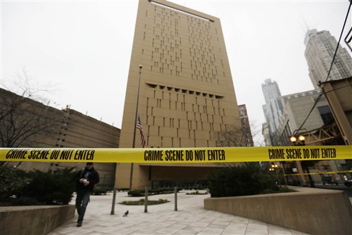 Police tape surrounds the Metropolitan Correctional Center on Tuesday in Chicago.