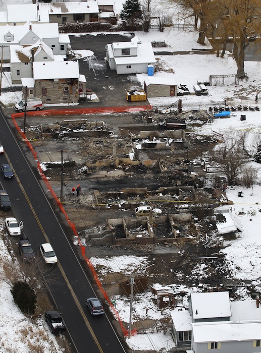 An aerial view of Lake Road in Webster where Williams Spengler set his house on fire then waited to shoot firefighters as they arrived to extinguish it. He killed two firefighters and injured two others. Spengler shot and killed himself. The fire consumed seven houses.