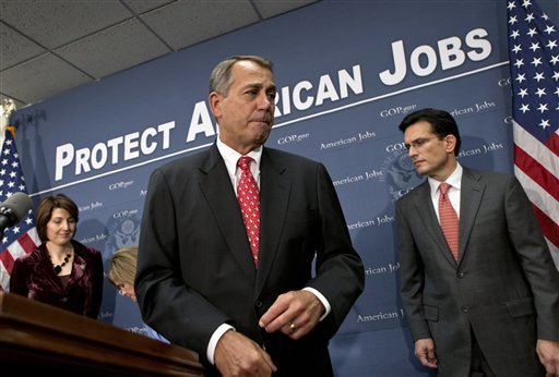 Speaker of the House John Boehner, R-Ohio, is joined by Rep. Cathy McMorris Rodgers, left, and House Majority Leader Eric Cantor, R-Va., right, as they finish a news conference about the fiscal cliff negotiations at the Capitol on Tuesday.