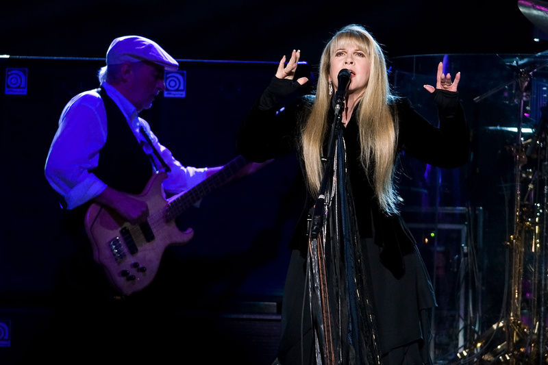 John McVie, left, and Stevie Nicks of Fleetwood Mac performat Madison Square Garden in New York in 2009. Fleetwood Mac is heading back on the road with a 34-city U.S. tour kicking off April 3, 2013, in Columbus, Ohio.