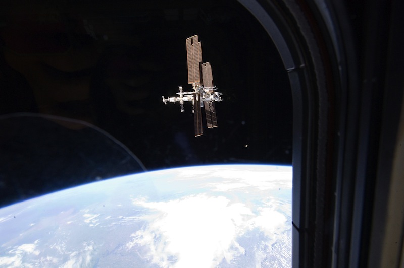 This Tuesday, July 19, 2011 image provided by NASA shows the International Space Station photographed by a member of Atlantis' STS-135 crew during a fly around as the shuttle departed the station on the last space shuttle mission. A panel of outside experts said Wednesday, Dec. 5, 2012 that NASA is adrift without a coherent vision for where it should be going. The report by the National Academy of Sciences doesn't blame the space agency. It faults the president, Congress and the nation. (AP Photo/NASA)