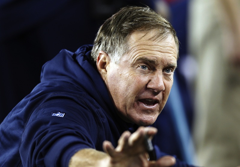 New England Patriots head coach Bill Belichick instructs his team during the third quarter of an NFL football game against the Houston Texans in Foxborough, Mass., Monday, Dec. 10, 2012. (AP Photo/Stephan Savoia) NFLACTION12; Gillette Stadium