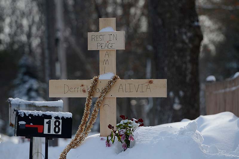 A makeshift memorial for Derrick Thompson, 19, and his girlfriend, Alivia Welch, 18, has been placed on Sokokis Road near the site of the shooting in Biddeford.