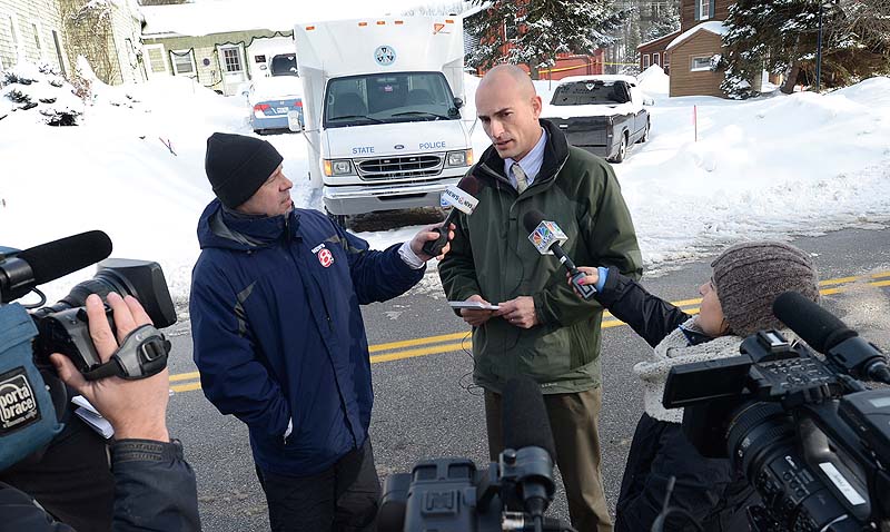 Maine State Police Sgt. Mark Holmquist speaks Sunday with reporters at the scene of a Saturday shooting at 17 Sokokis Road in Biddeford.