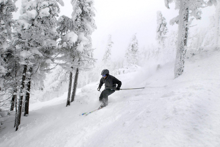 Skier Larry Ross skiing Saddleback's Casablanca glade, which Saddleback CEO Warren Cook made sure was cut by people long familiar with the mountain, in January 2010.