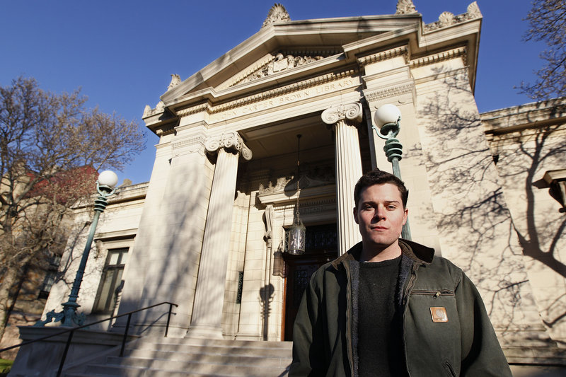 Lucas Mason-Brown stands in front of Brown University’s library. Mason-Brown helped crack a code developed by religious dissident Roger Williams in the 17th century.