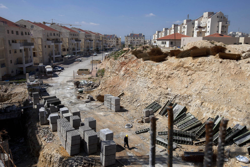 Israel’s approval of more Jewish homes in occupied lands, like these under construction in the West Bank, appears a defiant response to U.N. recognition of the Palestinian state.