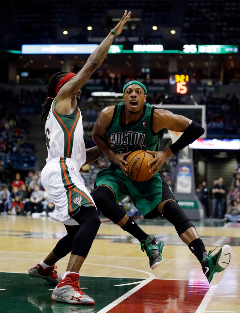 Paul Pierce of the Boston Celtics heads to the basket Saturday night against Marquis Daniels of the Milwaukee Bucks during Milwaukee’s 91-88 victory at home.