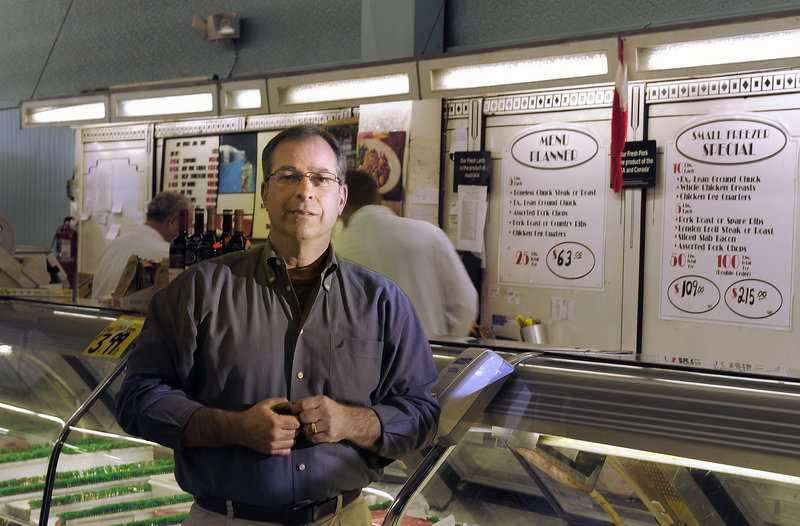 Alan Cardinal, owner of Smaha’s Legion Square Market in South Portland, estimates the business lost thousands of dollars during construction on neighborhood improvements.
