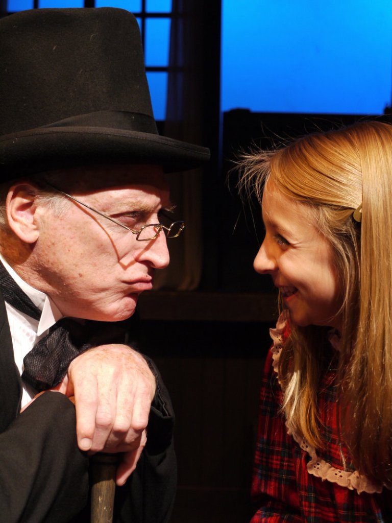 Joel Leffert as Scrooge and Maddy Leslie as Tiny Tim in The Public Theatre production of “A Christmas Carol.”