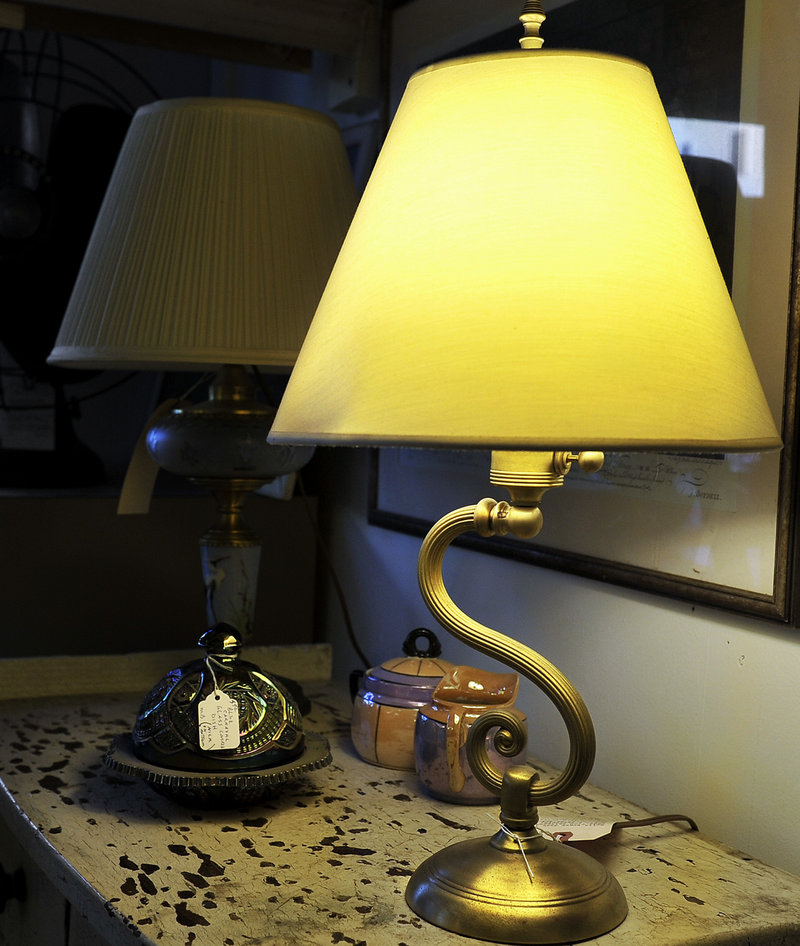 Allen also creates lamps from odds and ends, including a table lamp, left, made from an old chandelier.