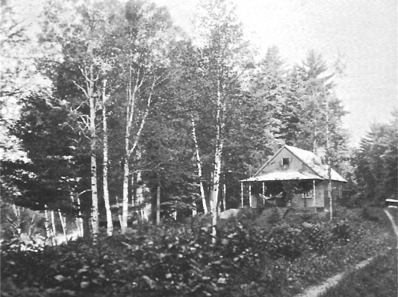 This photograph shows the lodge in 1930. Much of the lodge remains as it was when Louise Dickinson Rich lived there, including her desk and typewriter.