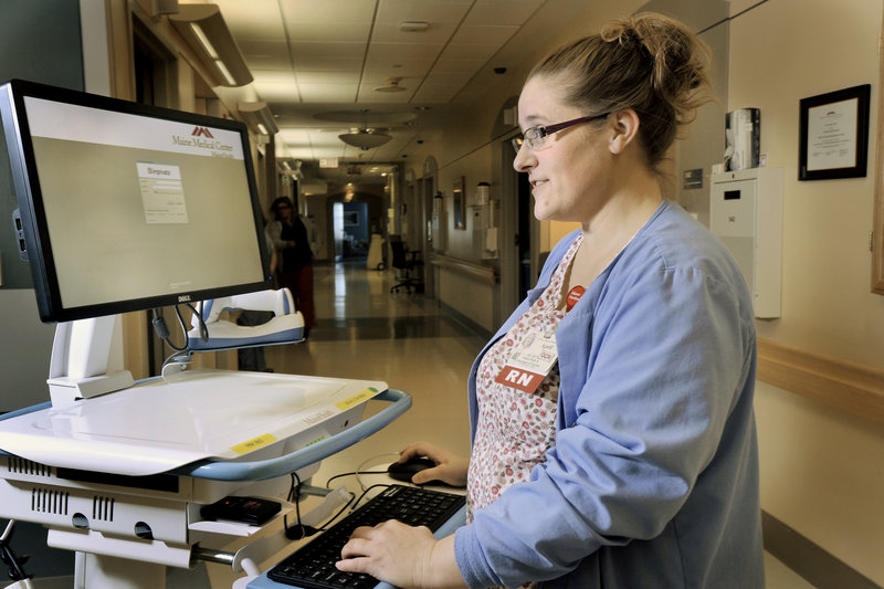 April Hothersall, an oncology charge nurse, is now working with a new, fully integrated electronic medical record system being implemented at MaineHealth and Maine Medical Center.