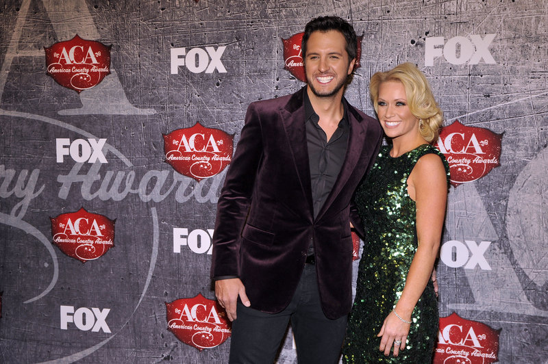 Singer Luke Bryan and Caroline Boyer arrive at the American Country Awards on Monday in Las Vegas.