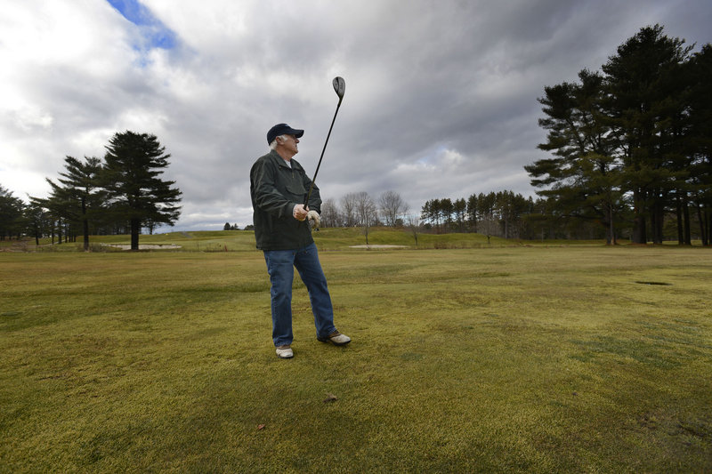 Norm McDonald of Gorham watches his approach shot on the 10th hole at Riverside Golf Course in Portland on Tuesday, Dec. 11, 2012.