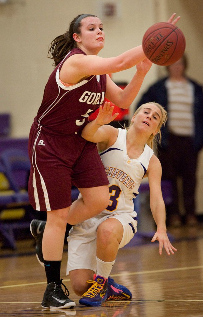Abby Hamilton of Gorham attempts to pass Tuesday night as Danielle Kane moves in for Cheverus during Cheverus’ 57-32 victory at home.