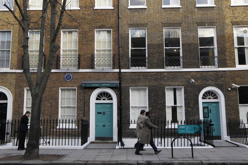 Charles Dickens’ home, left, in the Bloomsbury area of London was a dusty and slightly neglected museum that has been restored to bring the writer’s world to life. Its director says it aims to look “as if Dickens had just stepped out.”