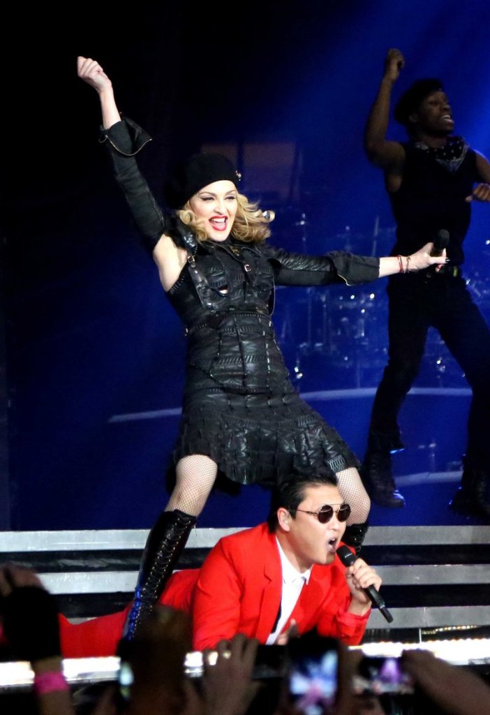 South Korean rapper PSY, performs with Madonna. PSY’s “Gangnam Style” music video was second only to Whitney Houston in 2012 searches.