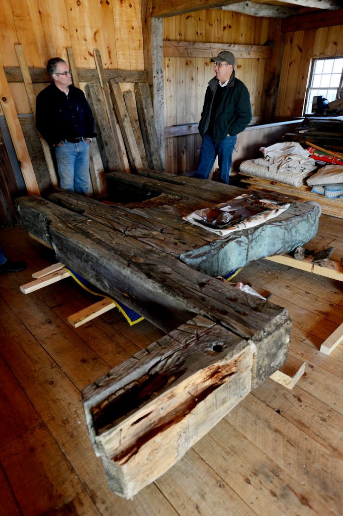 Arron Sturgis of Preservation Timber Framing in Berwick, with preservationist Jessica MilNeil, is working with the Ogunquit Museum of American Art to conserve a Bernard Langlais sculpture of a horse.