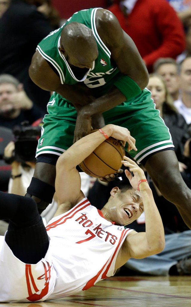 Kevin Garnett steals the ball from Houston’s Jeremy Lin during Friday’s game in Houston, won by the Rockets, 101-89.