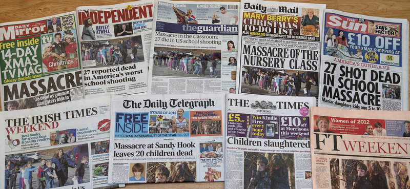A photo of a selection of British and Irish newspapers for Saturday shows their front-page headlines and reaction to the school shooting in Newtown, Conn., on Friday.