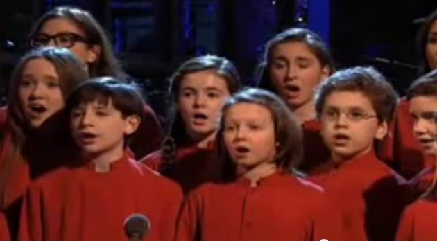 Members of the New York City Children's Chorus sing at the beginning of "Saturday Night Live" in a tribute to those killed in Newtown, Conn.