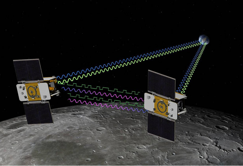 This artist’s rendering shows the twin spacecraft Ebb and Flow orbiting the moon. The pair were crashed into the lunar surface Monday in a deliberate end to their mission.
