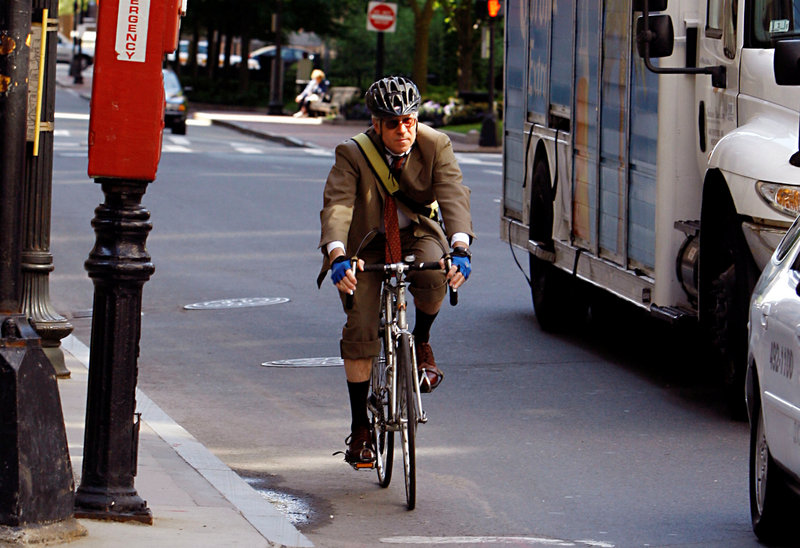 A cyclist commutes to work in Boston in 2008. A North Yarmouth man who rides his bike to work in Portland voices his appreciation for improvements to a stretch of road he rides and for the courtesy shown by road crews along the way.