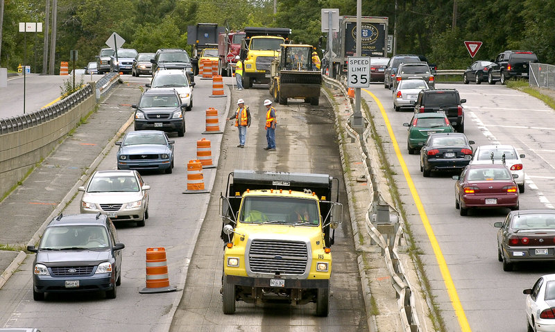 Route 1 in Brunswick undergoes repaving in a 2008 file photo. The American Society of Civil Engineers gave Maine a D for roads in a recent update on the state’s infrastructure.