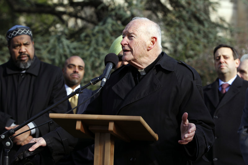 Cardinal Theodore E. McCarrick speaks outside Washington National Cathedral on Friday. Religious leaders pledged to press for an assault weapons ban and reforms to close the gun show loophole and ensure background checks for all gun sales.