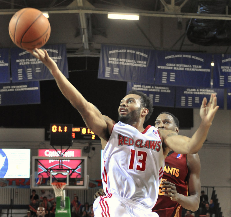 Maine’s Xavier Silas drives in for a layup at the end of the first half during the Red Claws’ 109-99 win over the Fort Wayne Mad Ants at the Portland Expo on Friday night. Silas finished with 19 points for Maine, which improved to 7-3.