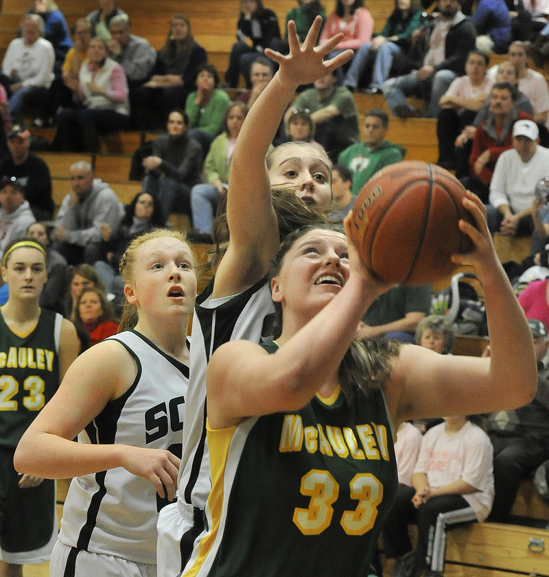 Victoria Lux of McAuley gets inside the Bonny Eagle defense for a shot during Saturday’s game in Standish. Lux scored 14 points as the Lions moved to 5-0 with a 71-41 victory.