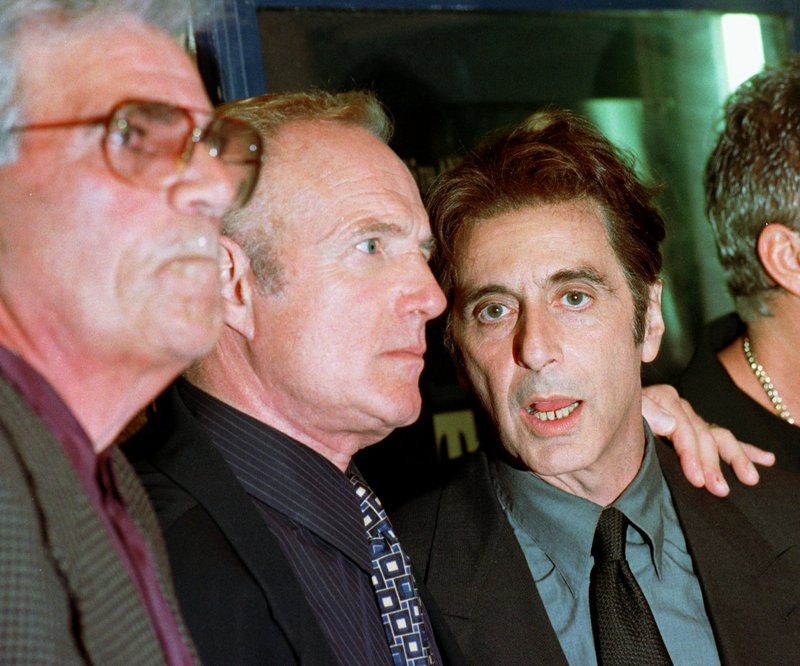 Actors Al Pacino, right, James Caan, center, and Alex Rocco attend the 25th anniversary premiere of the movie of “The Godfather” in San Francisco in 1997.
