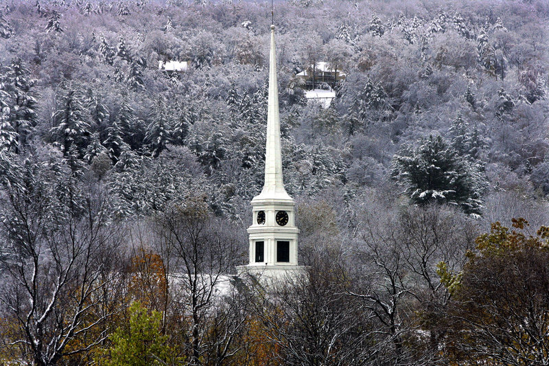 The steeple of the Stowe Community Church in Stowe, Vt., rises out of the snow-covered landscape. Churches with cell sites welcome the lease money from wireless companies, which can total as much as $4,000 a month.