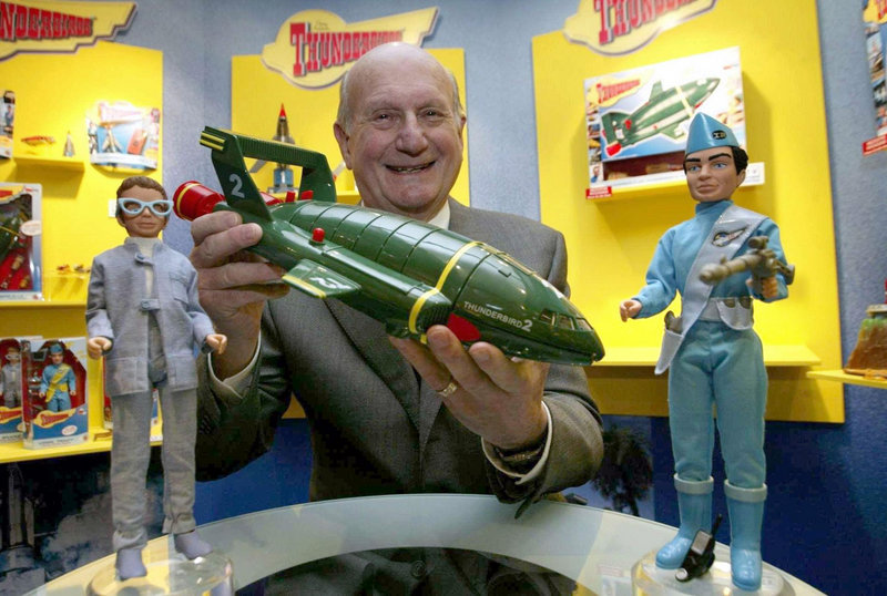 Gerry Anderson poses with a toy Thunderbird 2 in London in 2005 on the 40th anniversary of the sci-fi hit “Thunderbirds” first TV broadcast.