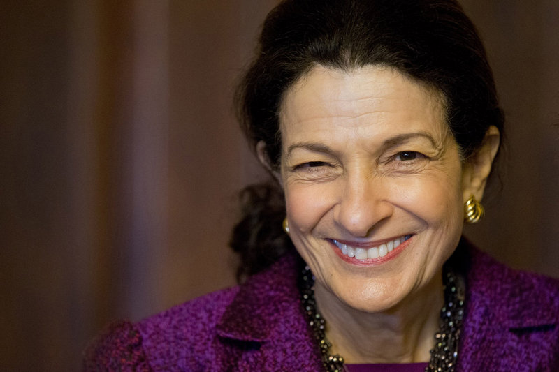 Sen. Olympia Snowe, named by Time magazine as one of 100 most influential people in the world in 2010, smiles after delivering her farewell speech to the Senate.