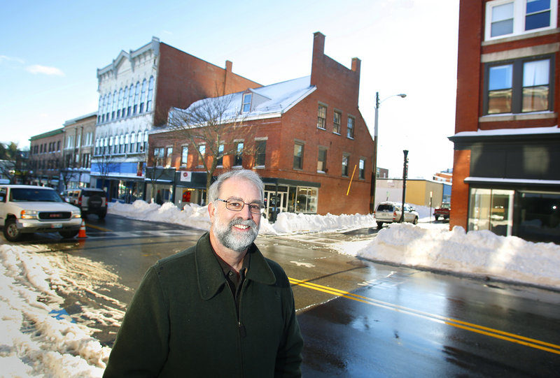 Biddeford Mayor Alan Casavant stands on Main Street in Biddeford on Friday. Casavant sees the closing of MERC this week as a turning point for the city after nearly three decades.