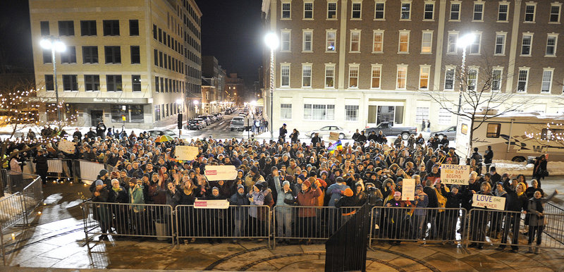 The number of well-wishers outside Portland City Hall ballooned just before midnight and the countdown to 12:01 a.m. Saturday, when same-sex marriage became legal in Maine.