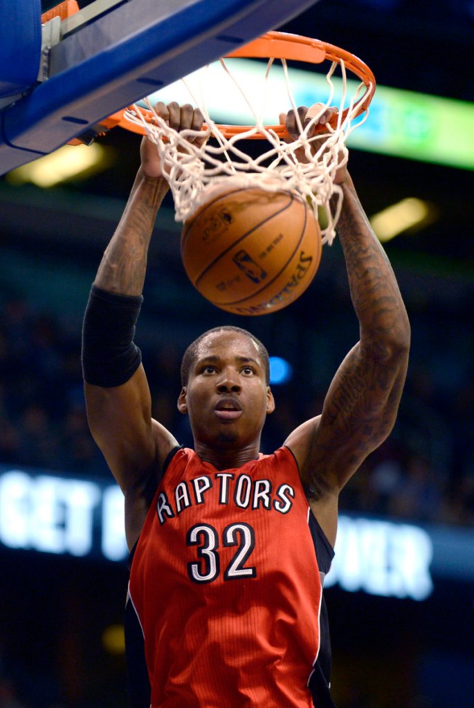 Toronto’s Ed Davis finishes a dunk during the Raptors’ 123-88 win over the Orlando Magic at Orlando, Fla. Davis, a rookie, had 18 points and seven rebounds.
