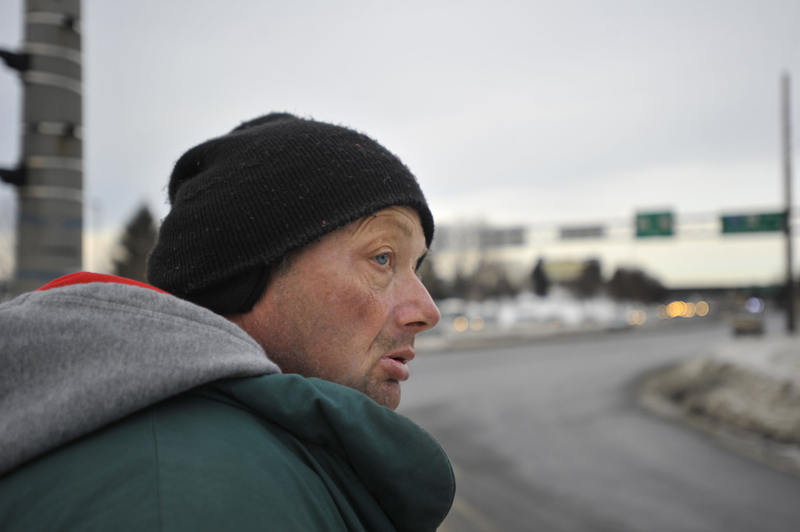 The 55-year-old homeless man checks for traffic before crossing a street on his way to the Portland Housing Authority.