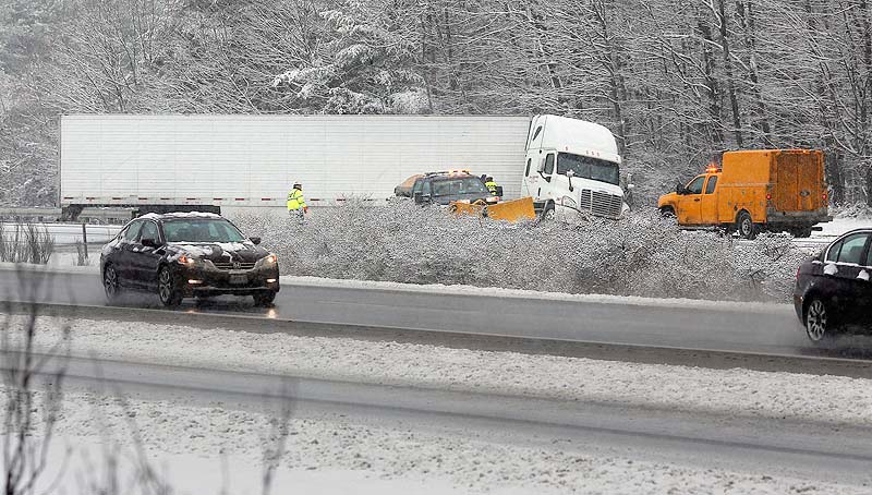 A tractor trailer truck jackknifed across I-295 Southbound just past Exit 17 in Yarmouth on Wednesday, January 16, 2013, as a winter storm caused slippery roads throughout Maine.