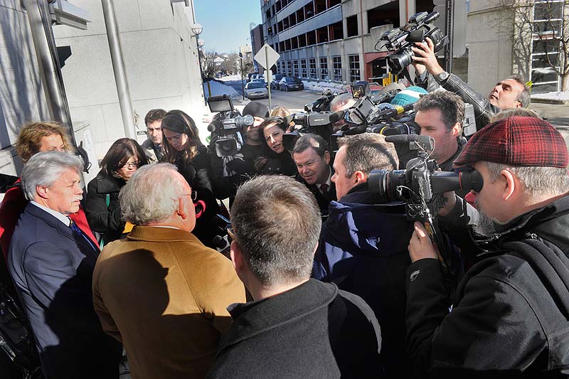 Defense attorney Dan Lilley and his client, Mark Strong, speak to the media outside of Cumberland County Court following a hearing on Friday, Jan. 18, 2013.
