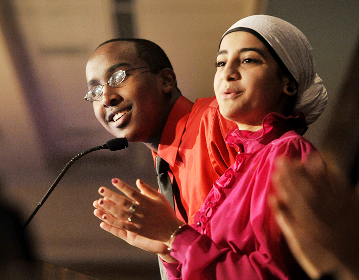 Mohamed Nur, a sophmore at Deering High School, left, and Casco Bay High School senior Fatma Adnad served as masters of ceremonies at the Martin Luther King Day breakfast held at the Holiday Inn by the Bay.