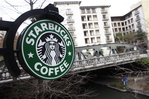 A sign outside a Starbucks hangs over the Riverwalk in San Antonio, Texas, in a 2010 file photo. 