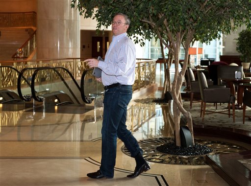 Google's executive chairman, Eric Schmidt, walks away from a hotel lounge in Beijing on Monday after a meeting with former New Mexico Gov. Bill Richardson. Schmidt, who is part of a delegation led by Richardson, is scheduled to leave Monday on a commercial flight bound for North Korea, a country considered to have the world's most restrictive Internet policies.