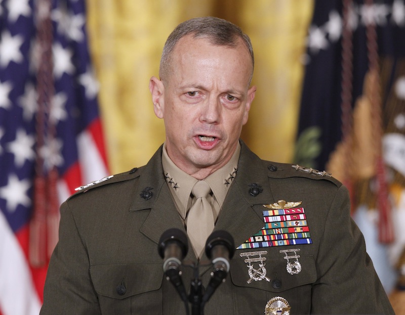 In an April 28, 2011, file photo then-Lt. Gen. John Allen, speaks in the East Room of the White House in Washington. U.S. defense officials say Gen. Allen, the top U.S. commander in Afghanistan, has been cleared of allegations of sending potentially inappropriate emails to a civilian woman linked to the sex scandal that ousted David Petraeus as CIA director. The officials said Tuesday, Jan. 22, 2012, the Defense Department's inspector general found the concerns about the Allen emails to be "unsubstantiated." (AP Photo/Charles Dharapak/file)