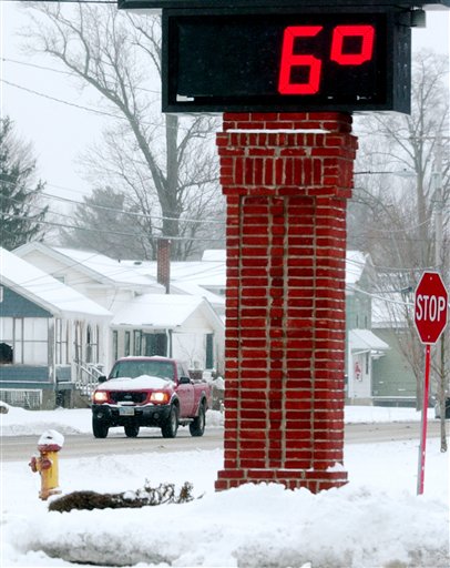 The thermometer on the Andover Bank in Austinburg Township in Ohio shows a temperature of 6 degrees Tuesday afternoon.