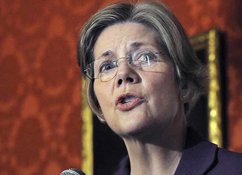 Massachusetts Sen. Elizabeth Warren speaks in Boston Friday in support of a bill filed in the state Legislature that would require gun owners to purchase liability insurance.