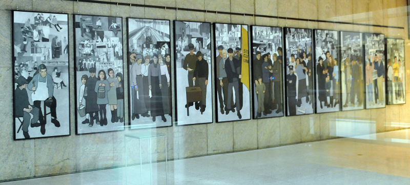 The 11-panel labor mural that Gov. Paul LePage ordered removed in March 2011 from the lobby of the Department of Labor in Augusta is shown at its new home on display in the entrance of the Maine State Museum in Augusta.