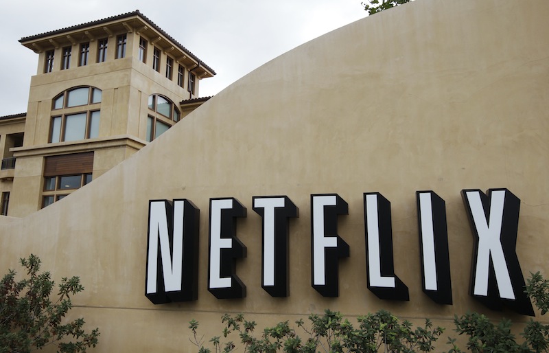 In this Oct. 10, 2011, file photo, the exterior of Netflix headquarters is seen in Los Gatos, Calif. Netflix stock, on Thursday, Jan. 24, 2013, is on its way to its biggest one-day gain since the video subscription service went public more than a decade ago. (AP Photo/Paul Sakuma)